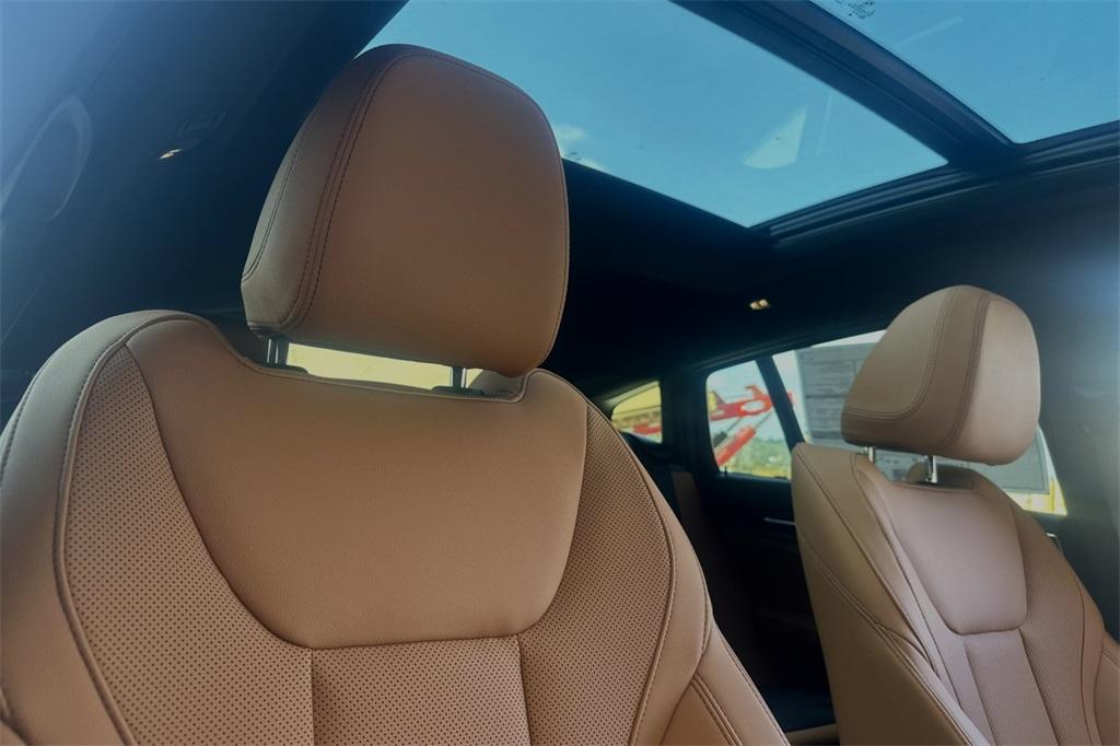 used 2025 BMW X4 car, priced at $51,988