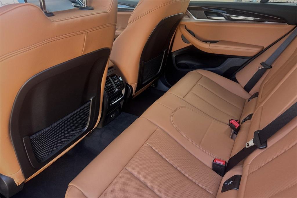 used 2025 BMW X4 car, priced at $51,988