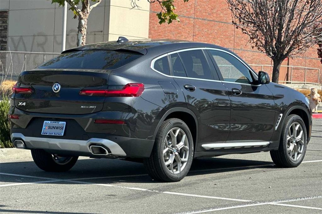used 2025 BMW X4 car, priced at $51,988