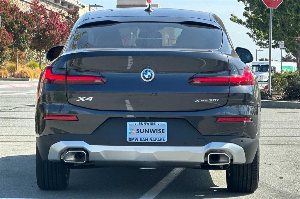 used 2025 BMW X4 car, priced at $51,988