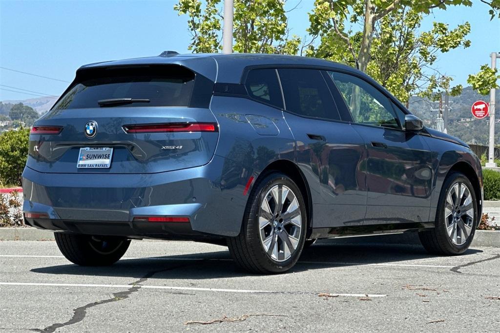 new 2026 BMW iX car, priced at $83,625