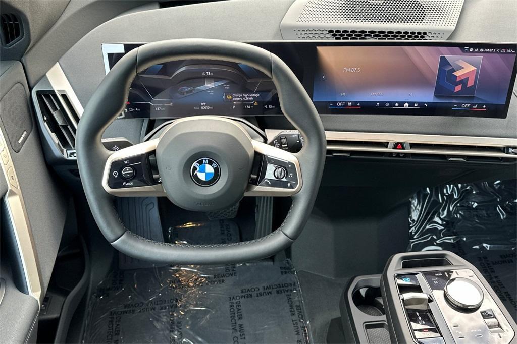 new 2026 BMW iX car, priced at $78,675