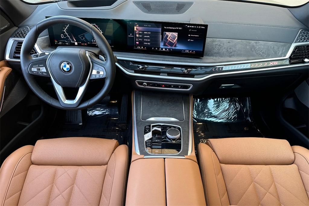 used 2025 BMW X5 car, priced at $68,900