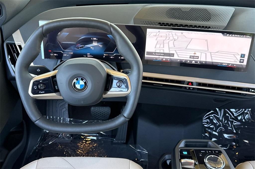 new 2026 BMW iX car, priced at $87,720