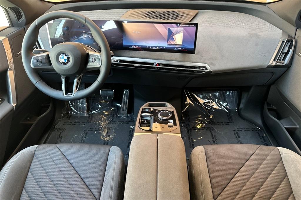 new 2026 BMW iX car, priced at $91,025