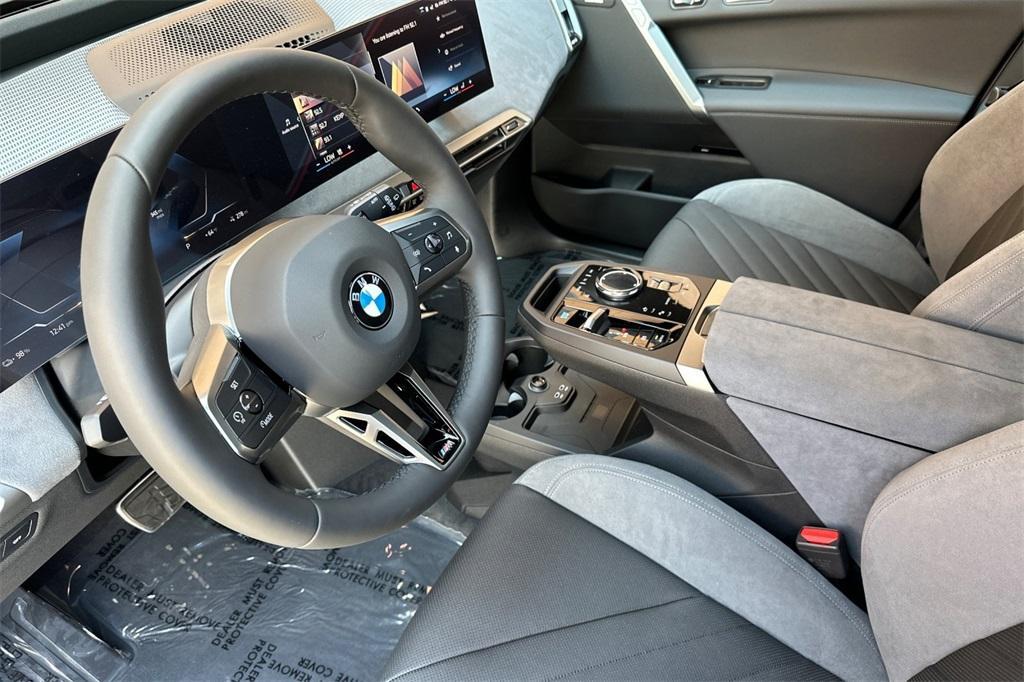 new 2026 BMW iX car, priced at $90,770