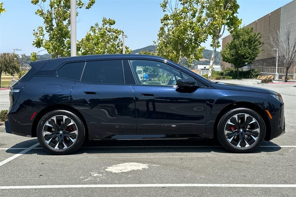 new 2026 BMW iX car, priced at $90,770