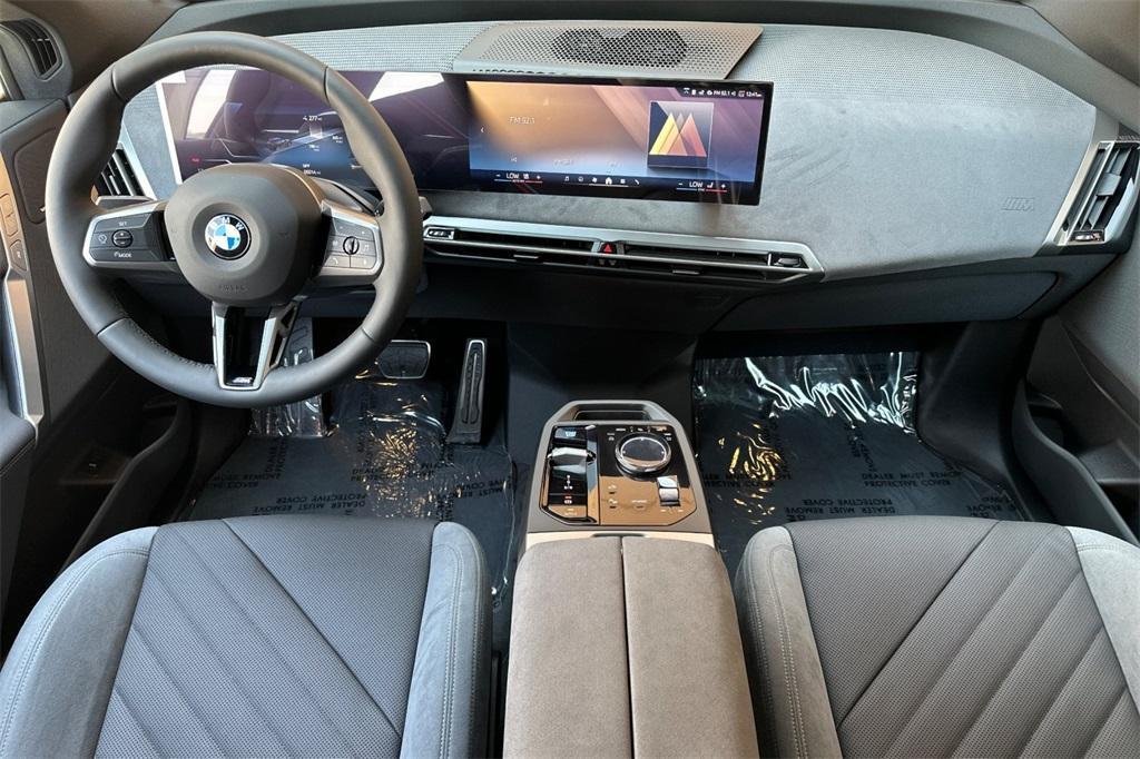 new 2026 BMW iX car, priced at $90,770