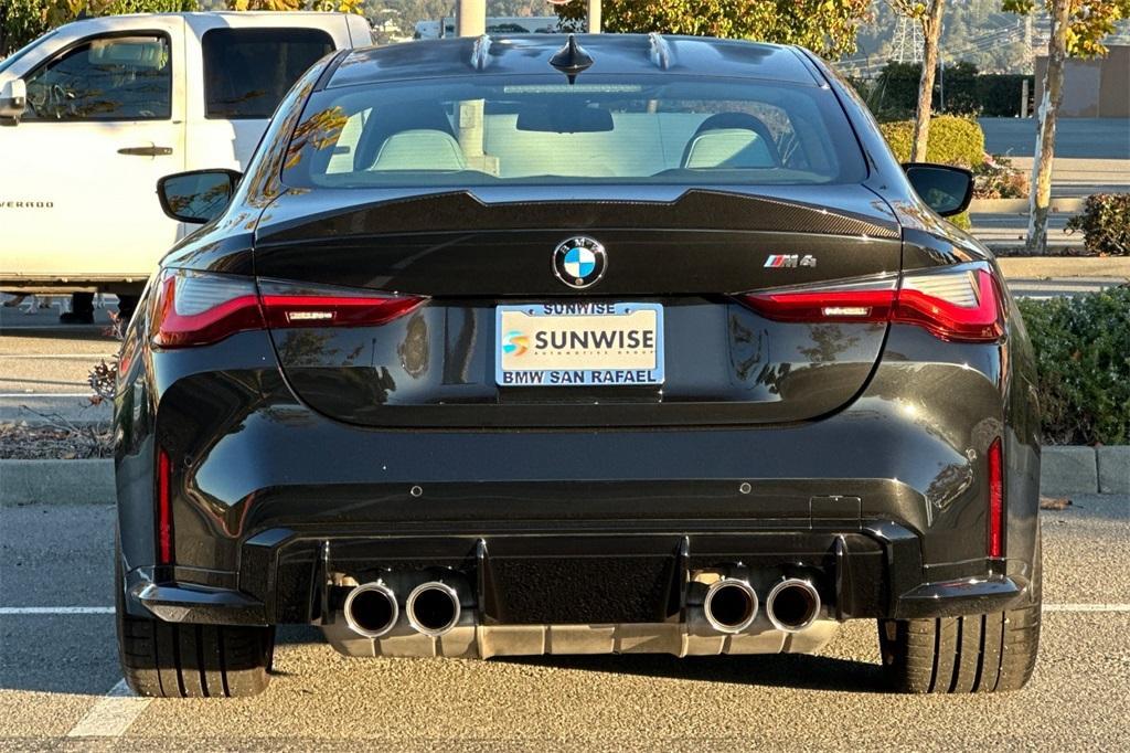 used 2022 BMW M4 car, priced at $64,900