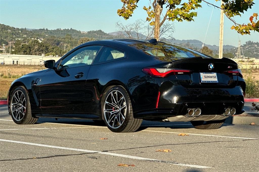 used 2022 BMW M4 car, priced at $64,900