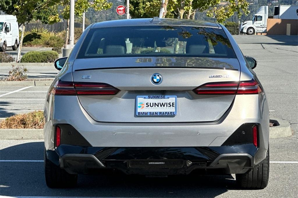 used 2024 BMW i5 car, priced at $59,888