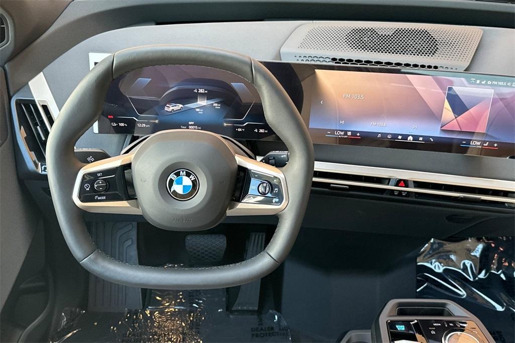 new 2026 BMW iX car, priced at $83,125