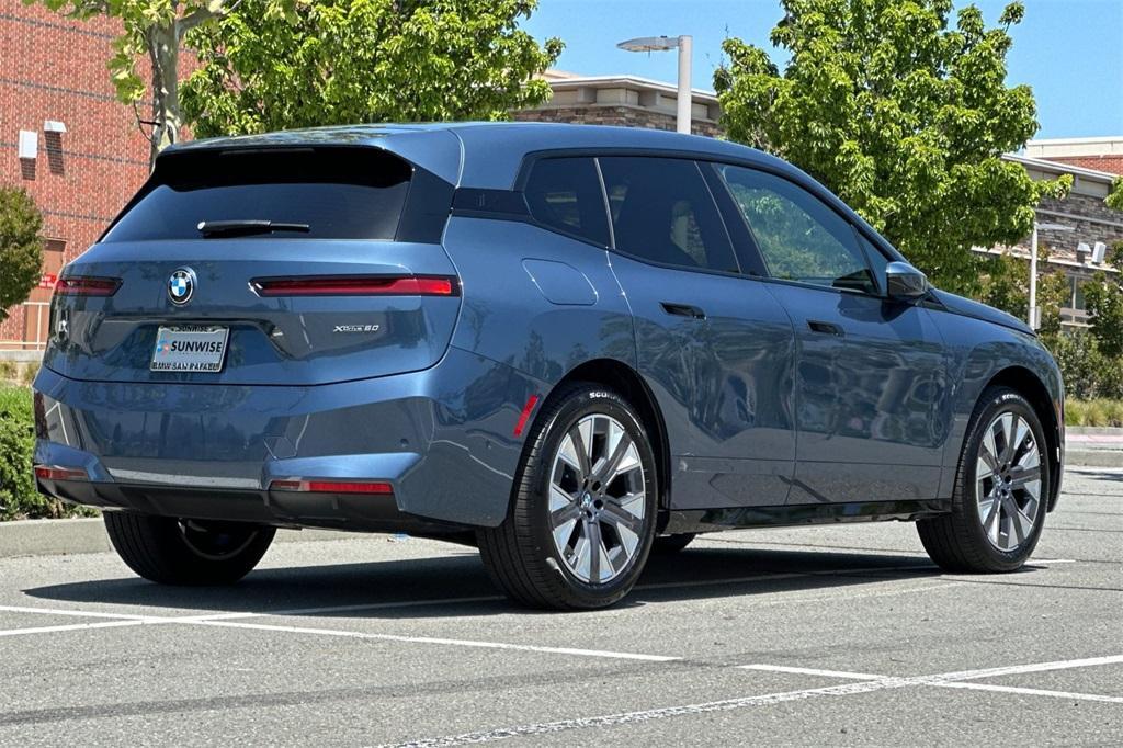 new 2026 BMW iX car, priced at $97,825
