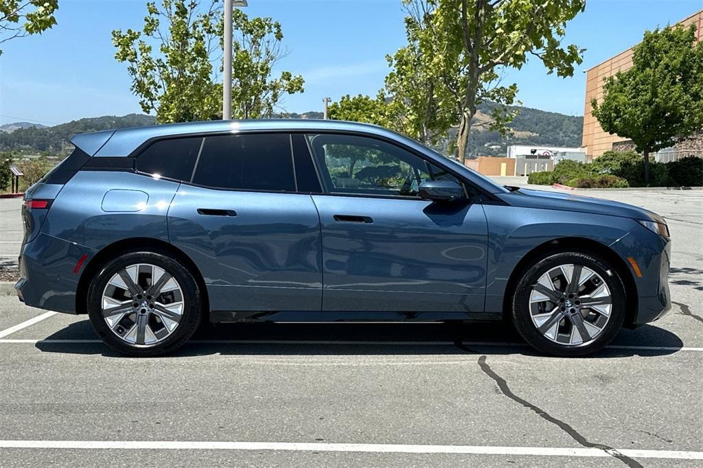 new 2026 BMW iX car, priced at $97,825
