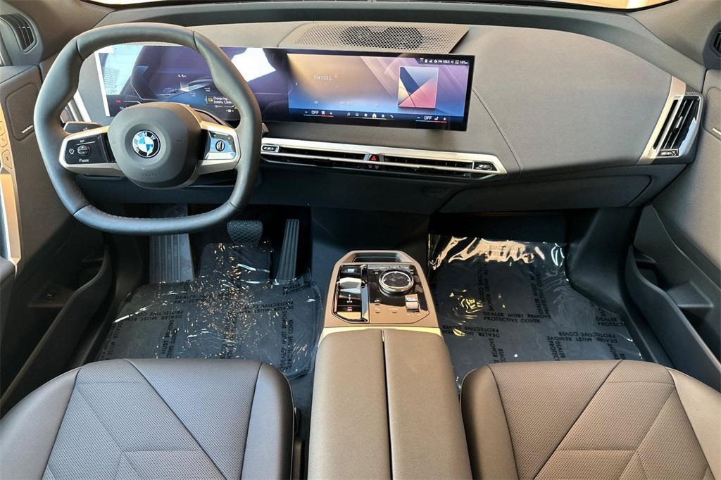 new 2026 BMW iX car, priced at $97,825
