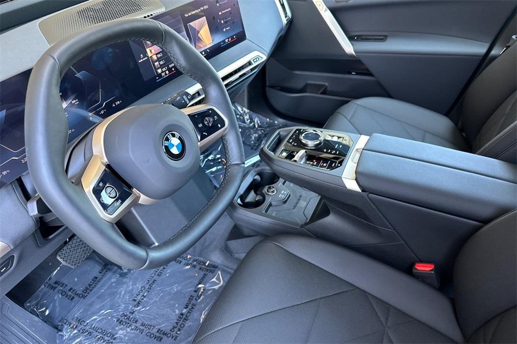 new 2026 BMW iX car, priced at $95,425