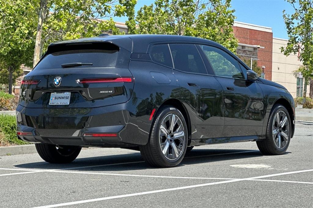new 2026 BMW iX car, priced at $84,625