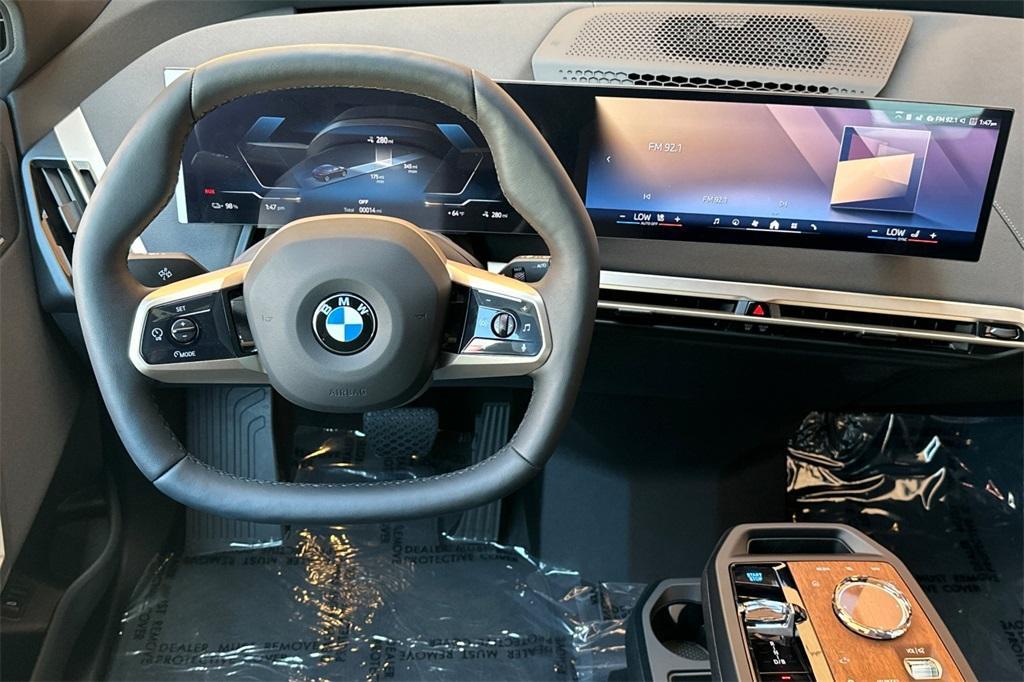 new 2026 BMW iX car, priced at $84,625