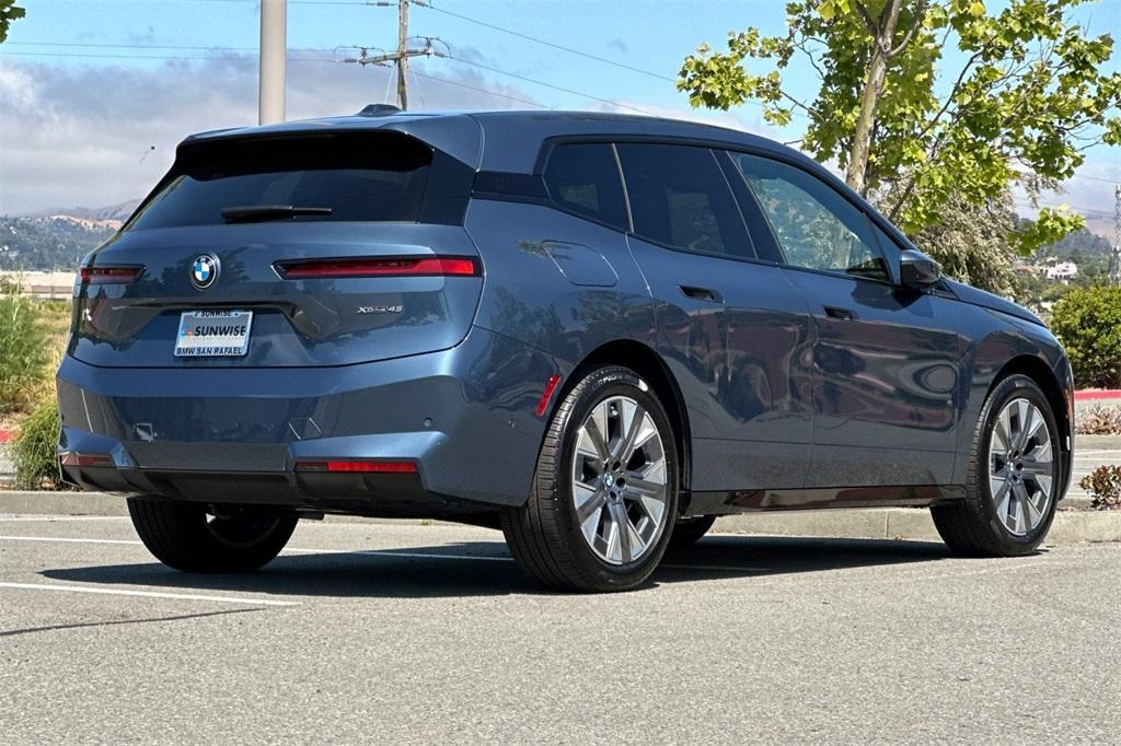 new 2026 BMW iX car, priced at $84,725