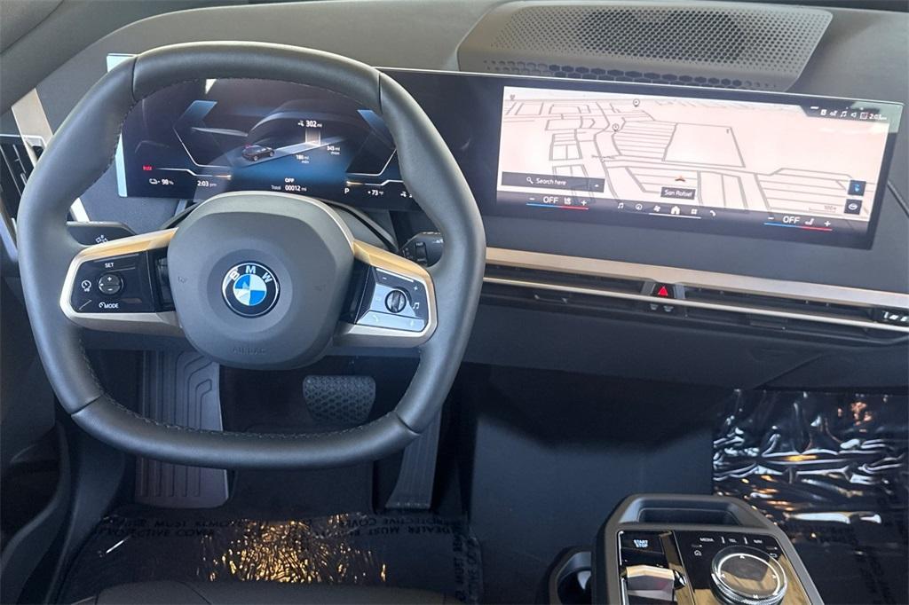 new 2026 BMW iX car, priced at $87,070