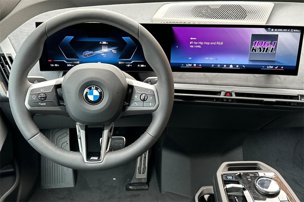 new 2026 BMW iX car, priced at $104,475
