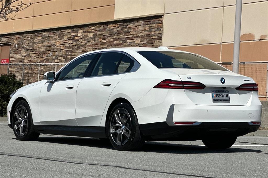 used 2024 BMW i5 car, priced at $59,900