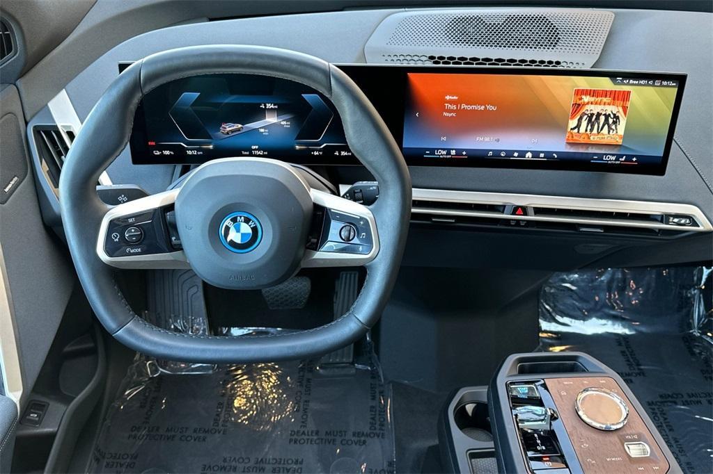 used 2024 BMW iX car, priced at $66,900