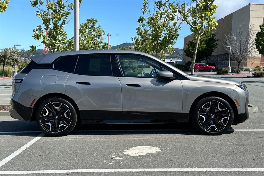 used 2024 BMW iX car, priced at $66,900