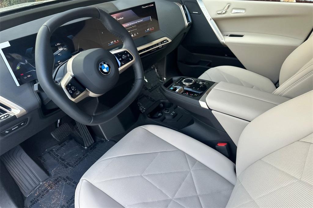 new 2026 BMW iX car, priced at $84,725