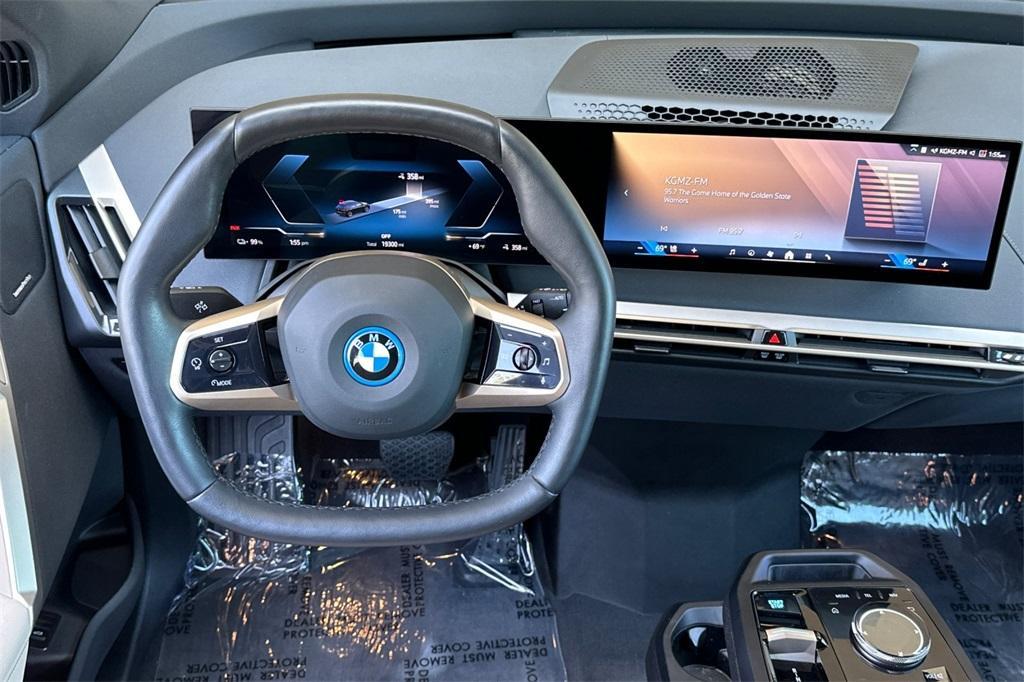 used 2024 BMW iX car, priced at $61,988