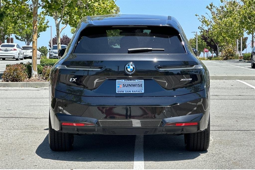 used 2024 BMW iX car, priced at $61,988