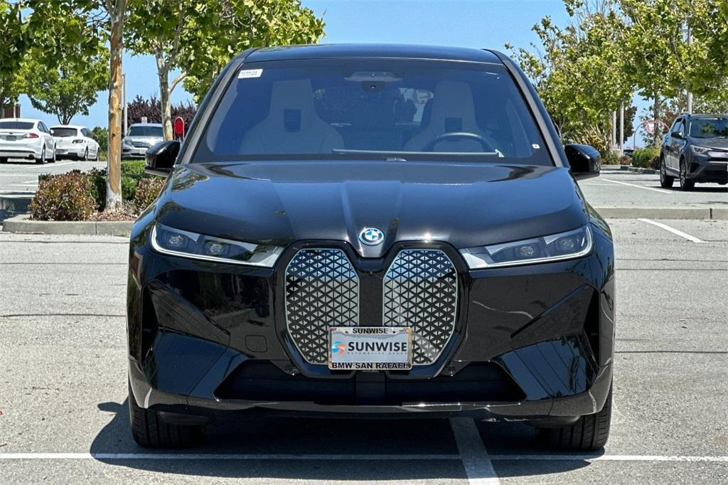 used 2024 BMW iX car, priced at $61,988