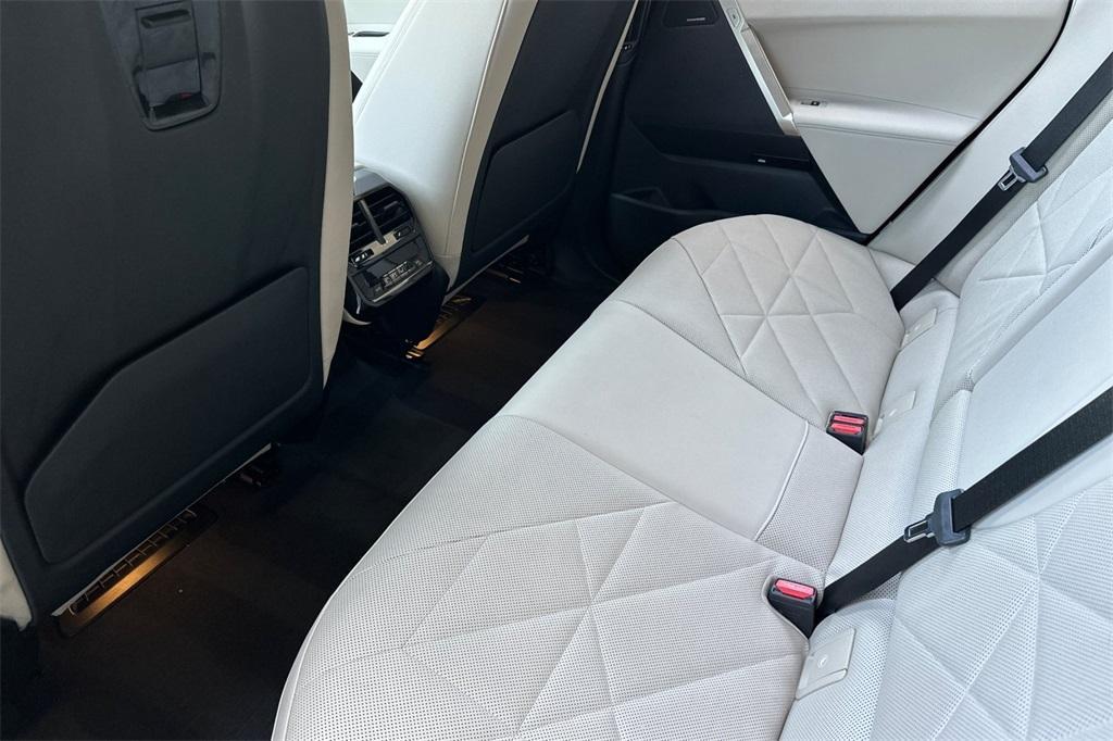 used 2024 BMW iX car, priced at $61,988