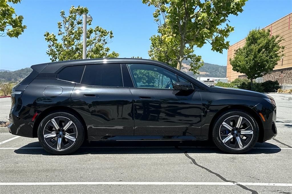 used 2024 BMW iX car, priced at $61,988
