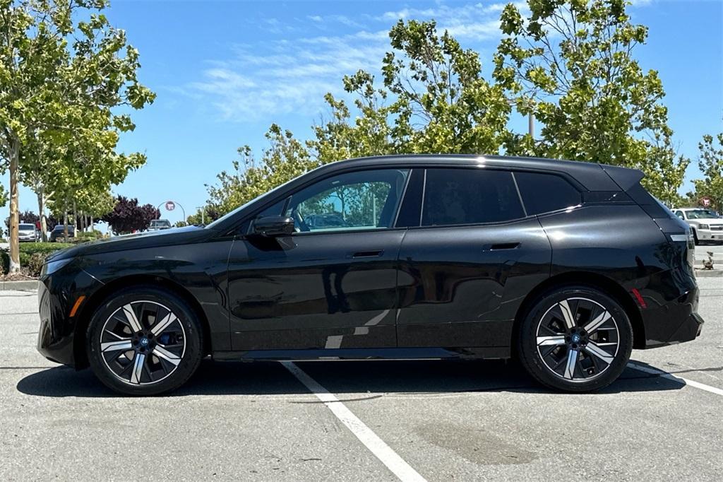 used 2024 BMW iX car, priced at $61,988