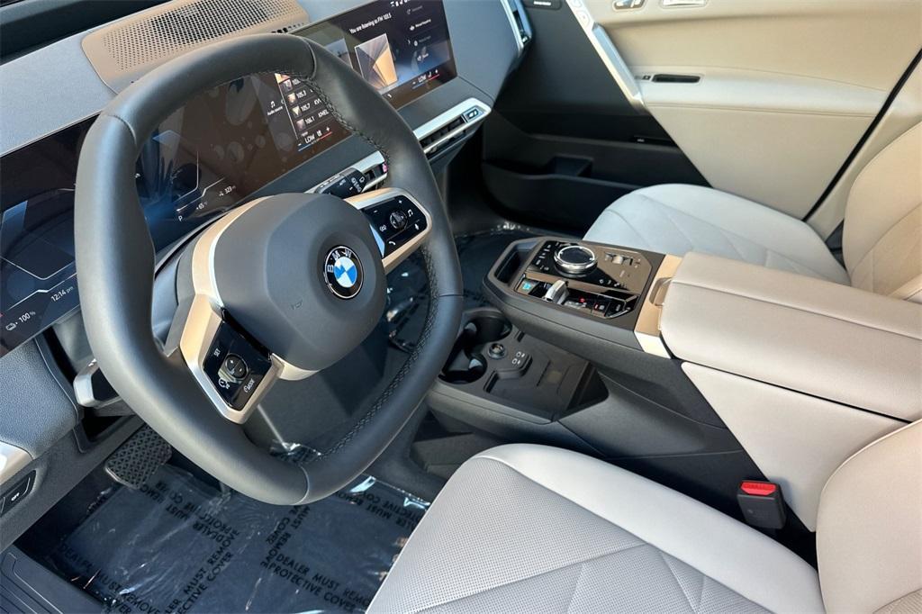 new 2026 BMW iX car, priced at $98,825