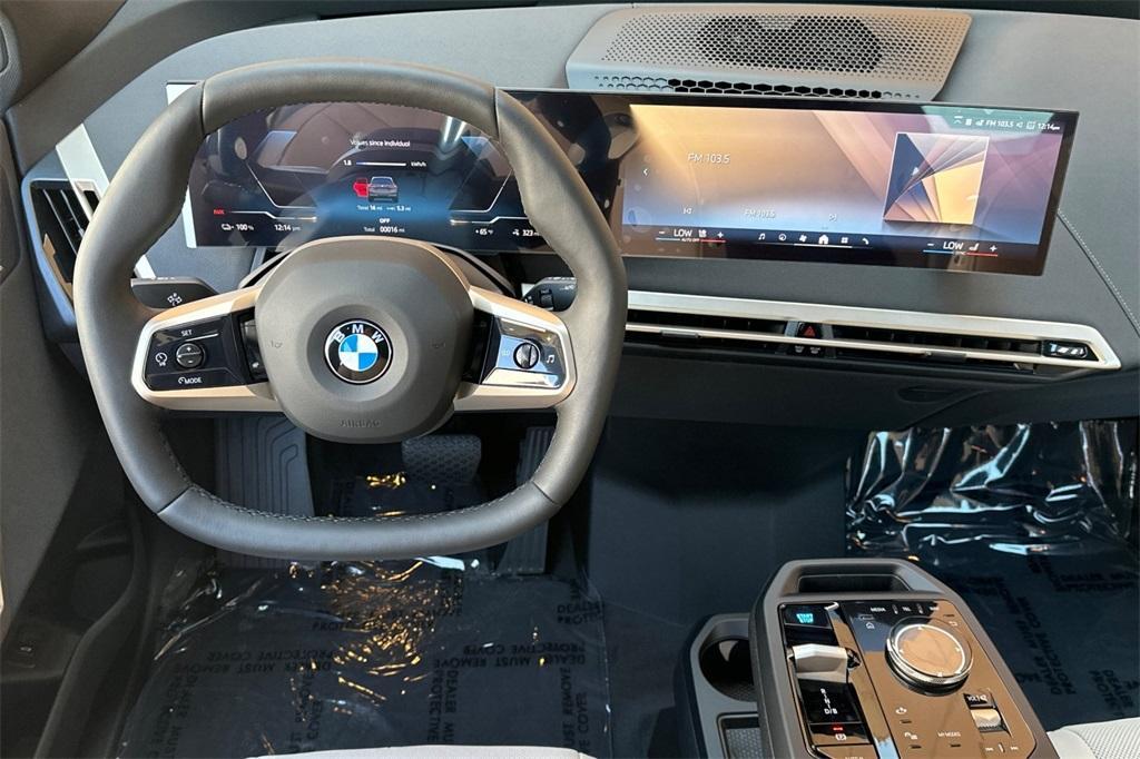 new 2026 BMW iX car, priced at $98,825