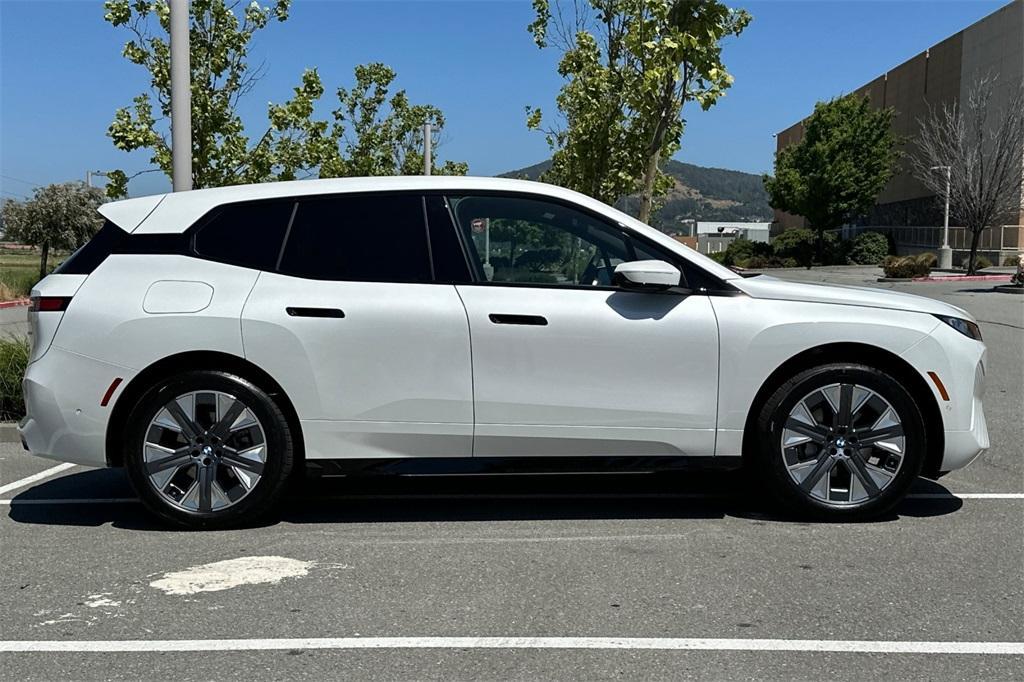 new 2026 BMW iX car, priced at $97,825