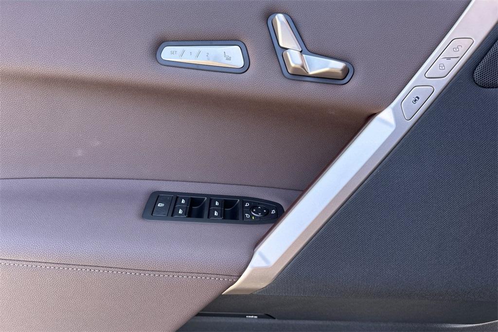 new 2026 BMW iX car, priced at $97,825