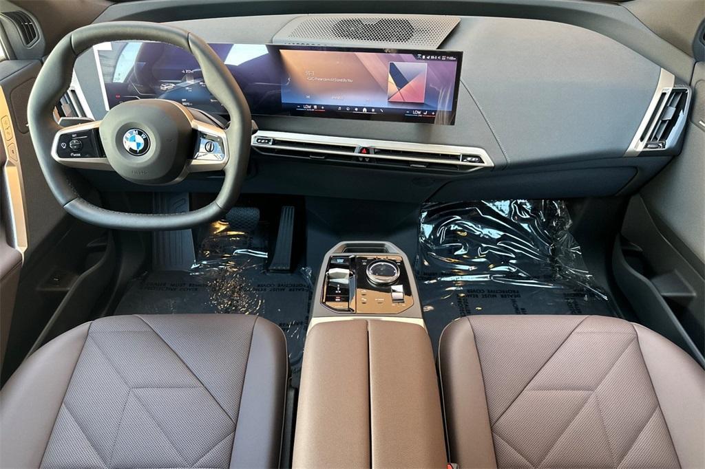 new 2026 BMW iX car, priced at $97,825