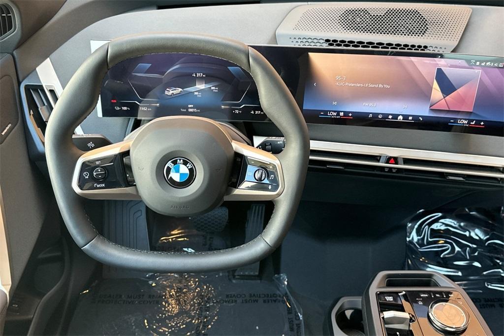 new 2026 BMW iX car, priced at $97,825