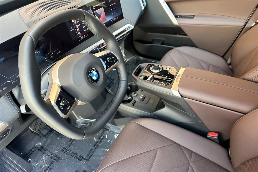 new 2026 BMW iX car, priced at $97,825