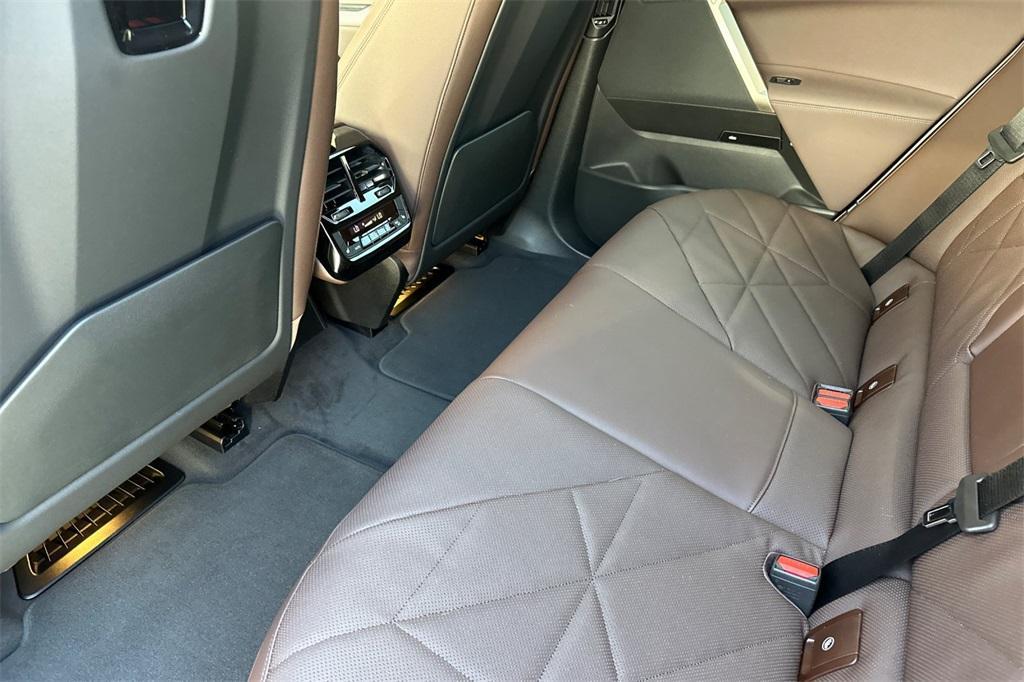 new 2026 BMW iX car, priced at $97,825