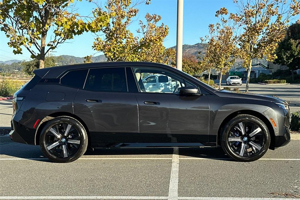 used 2025 BMW iX car, priced at $84,900