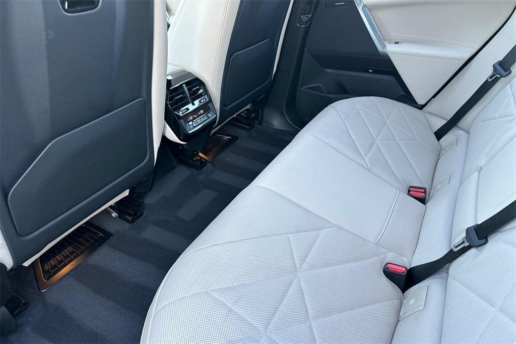 used 2025 BMW iX car, priced at $84,900