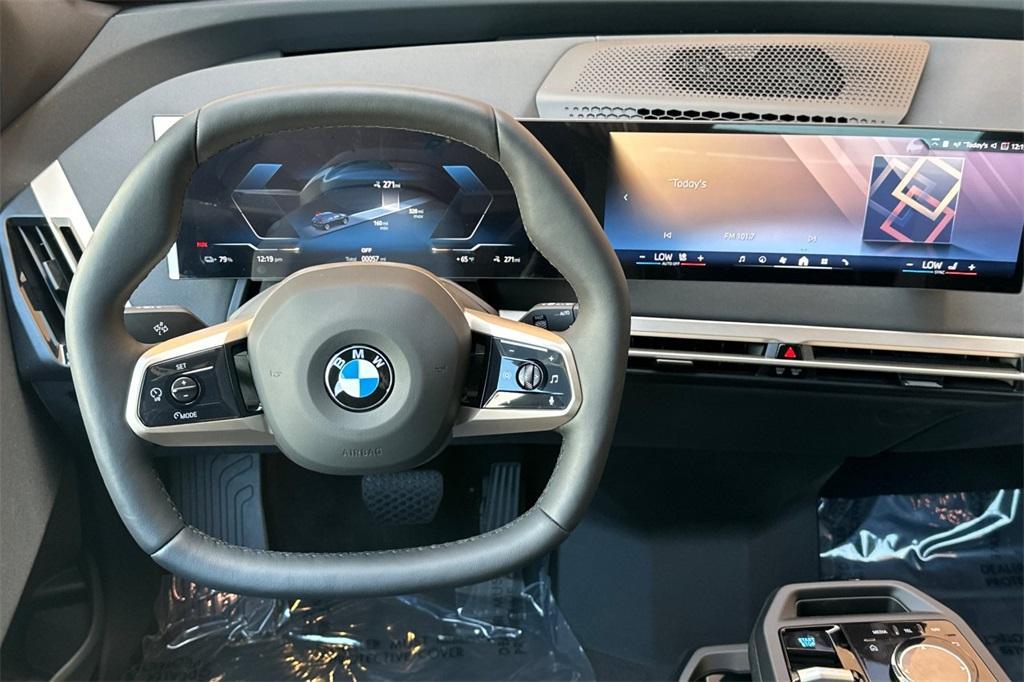 new 2026 BMW iX car, priced at $95,275