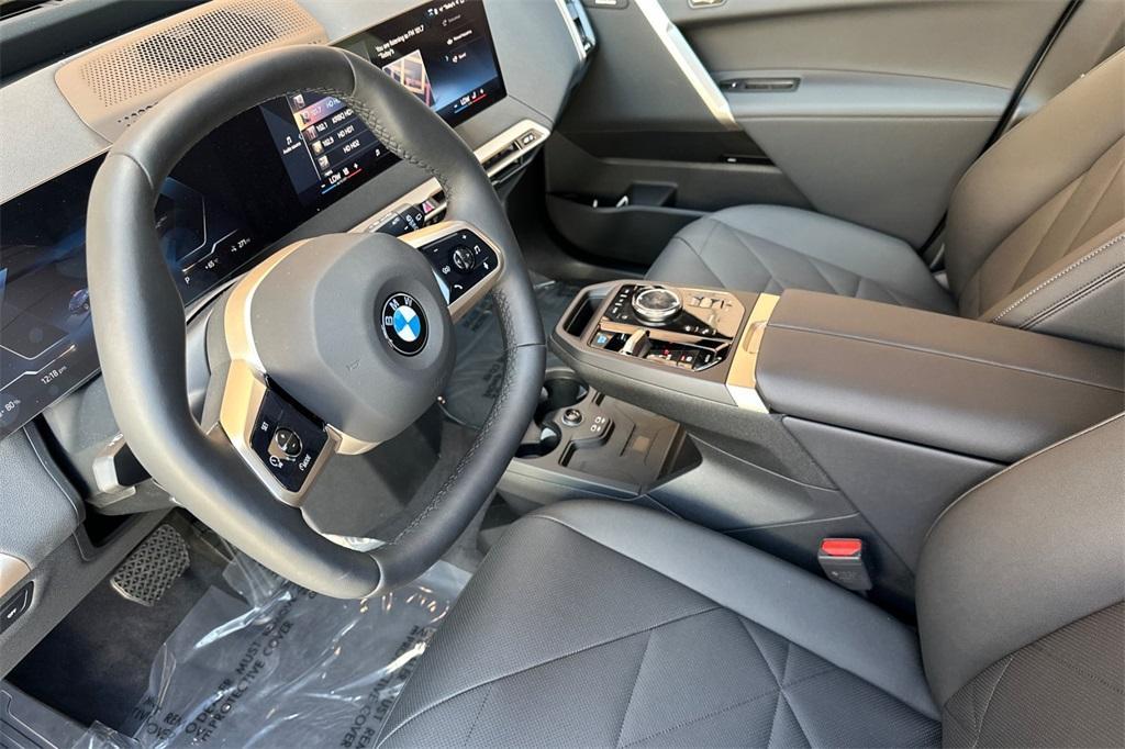 new 2026 BMW iX car, priced at $95,275