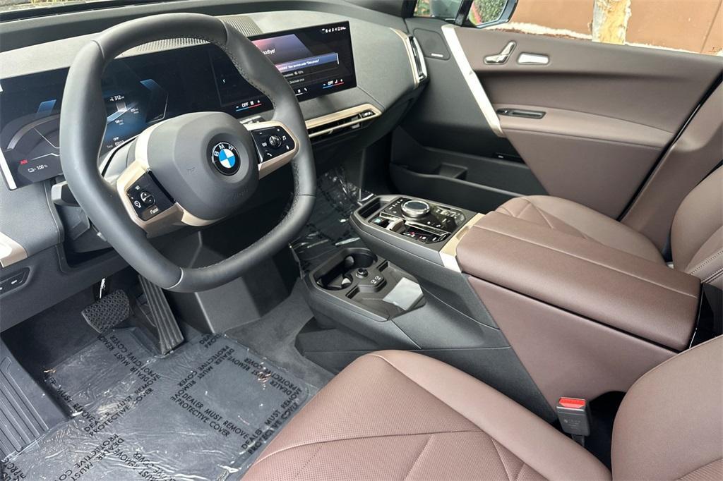 new 2026 BMW iX car, priced at $84,850