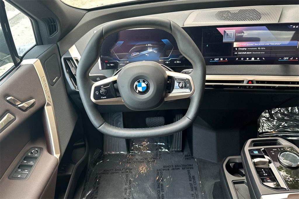 new 2026 BMW iX car, priced at $84,850