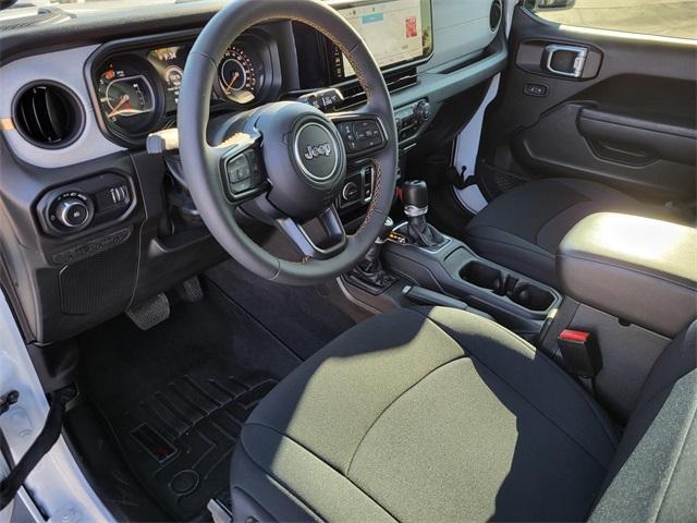 used 2024 Jeep Wrangler car, priced at $33,602